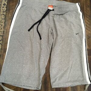 Nike Kids Gray Athletic Shorts XL Tie bottoms and front waist top. Great n